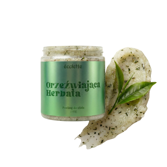 Peeling Orzeźwiająca Herbata Écolette z widoczną cukrową strukturą i liściem zielonej herbaty.
